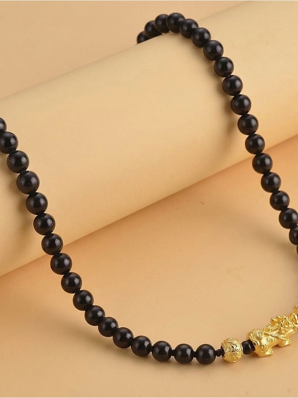 Shungite Feng Shui Necklace 20” with Pixiu Charm in Goldtone. 202 ctw